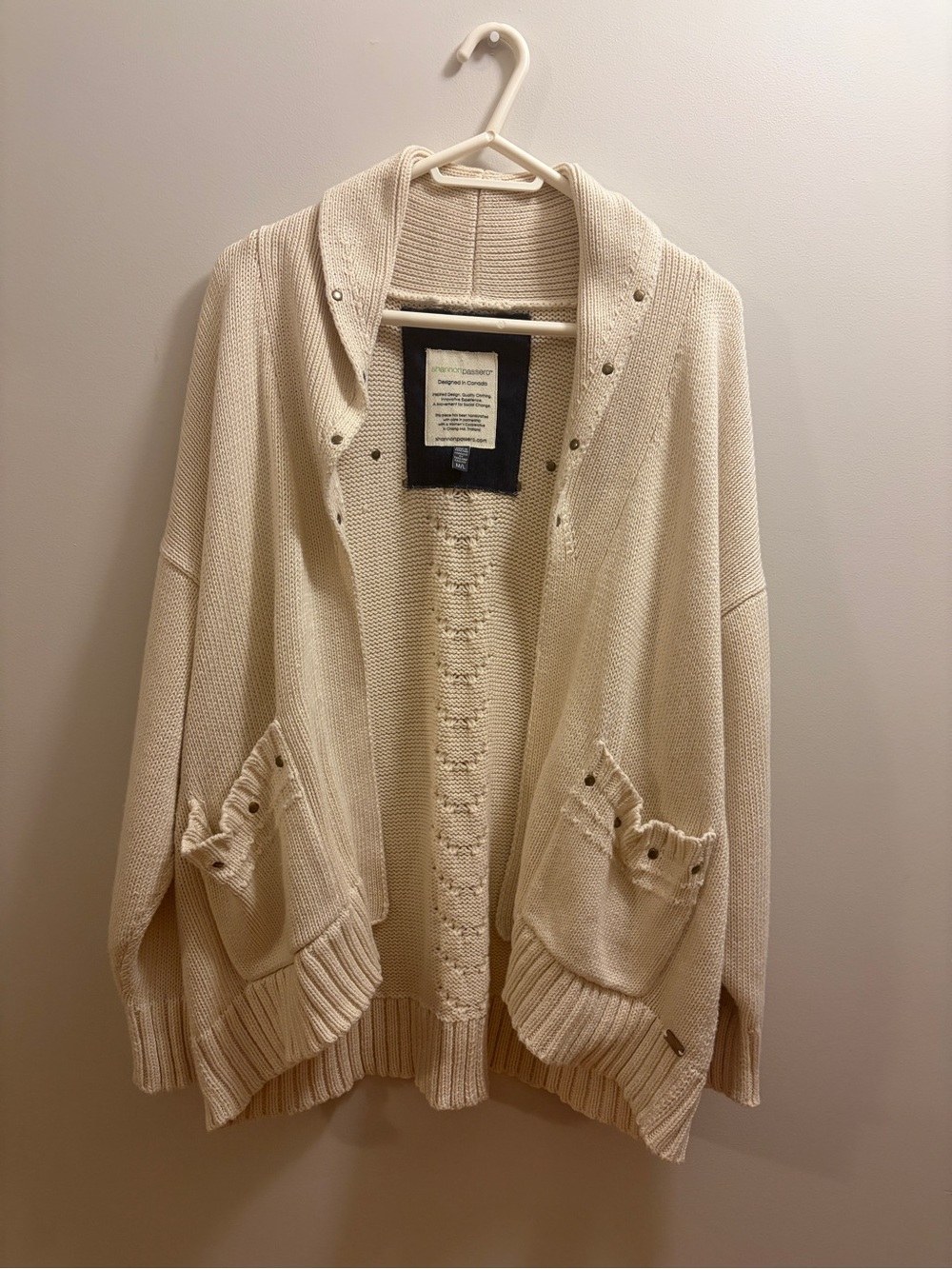 cream-colored open-front knit cardigan by Shannon Passero